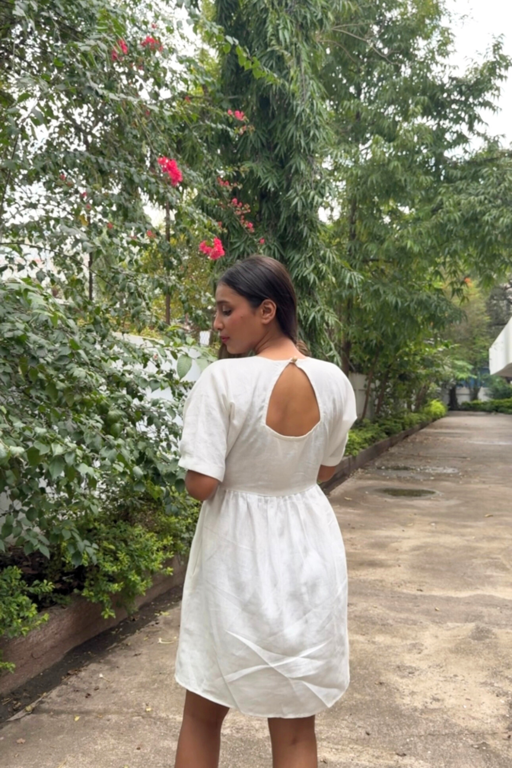 Sustainable white summer dress front and back
