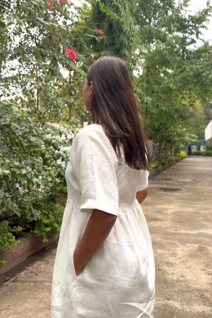 Organic casual white dress styled with sneakers
