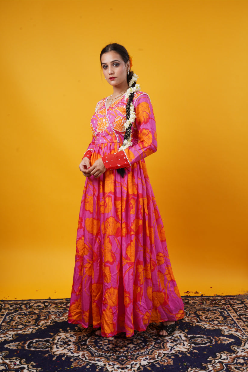 A pink floral gown with handwork