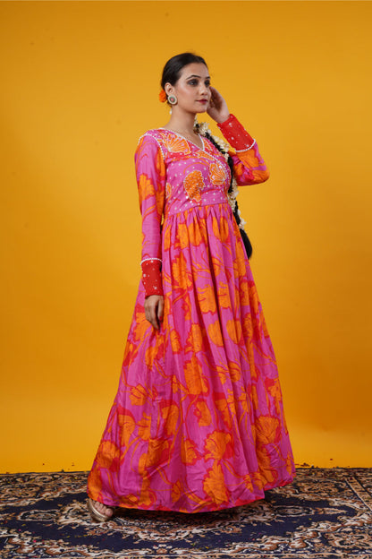 A pink floral gown with handwork