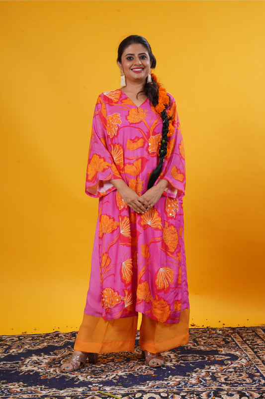 Fuschia pink floral suit set with long sleeves and palazzo