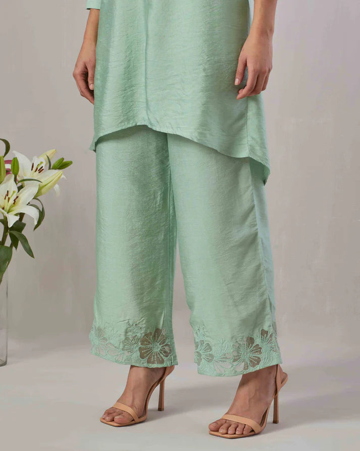 Sage green kurta and pant co-ord set featuring organza appliqué and embroidery on neckline, sleeve and pant.  100% Viscose Chanderi  Made in India