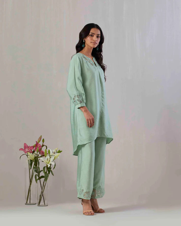 Sage green kurta and pant co-ord set featuring organza appliqué and embroidery on neckline, sleeve and pant.  100% Viscose Chanderi  Made in India