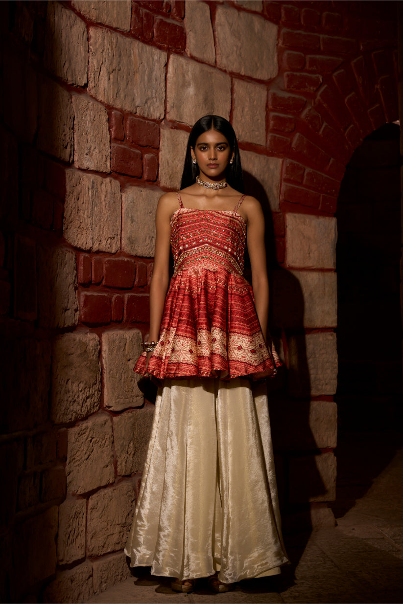 Scarlet Peplum top with flared bottom Elegance