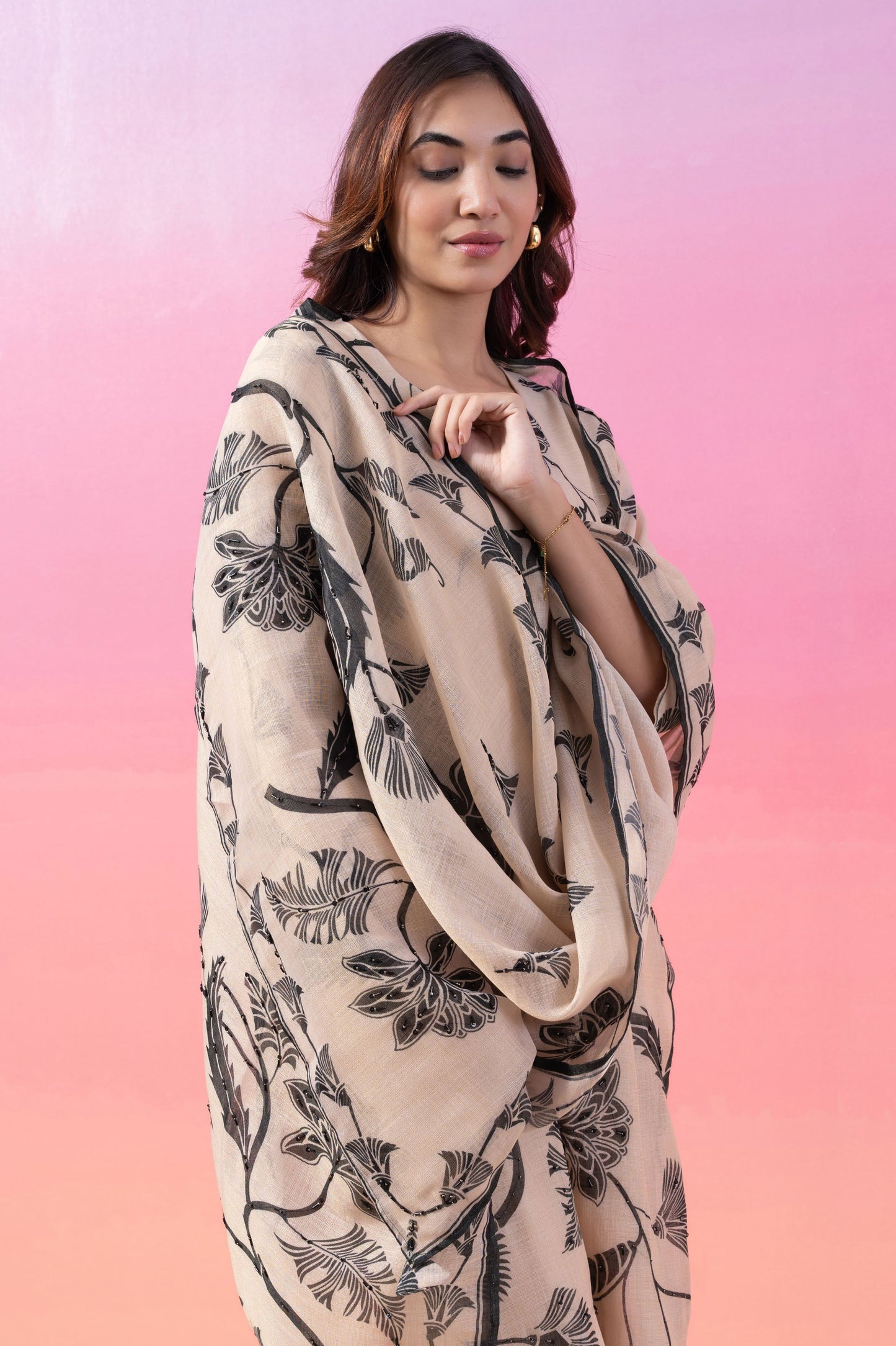 JANHAVI IN CREAM AND GREEN LINEN KURTA SET