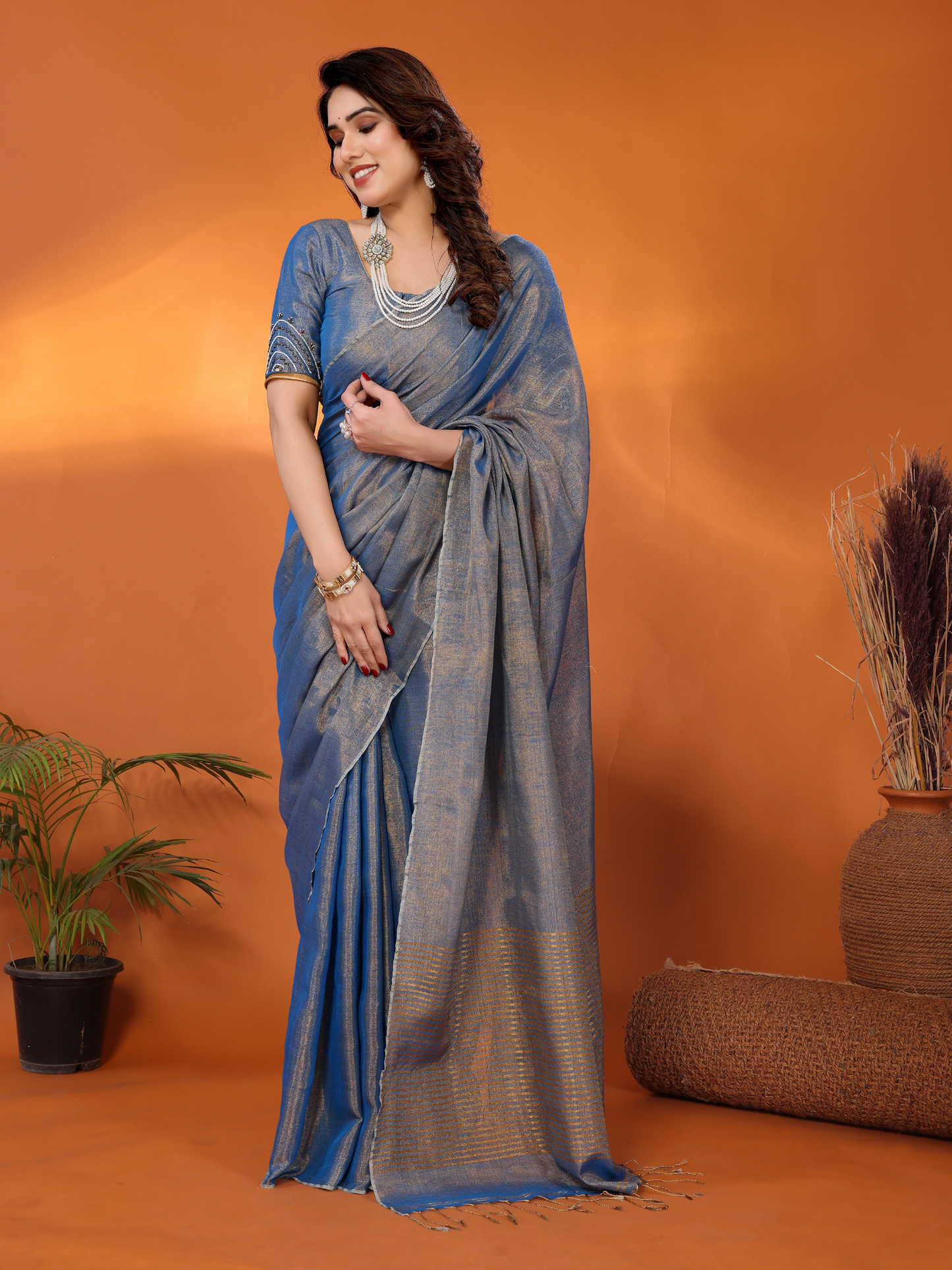 Chandrika tissue saree with embroidered blouse