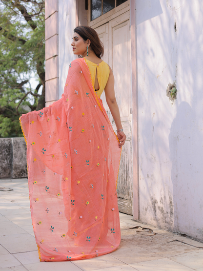 Ganik peach embroidered saree with blouse