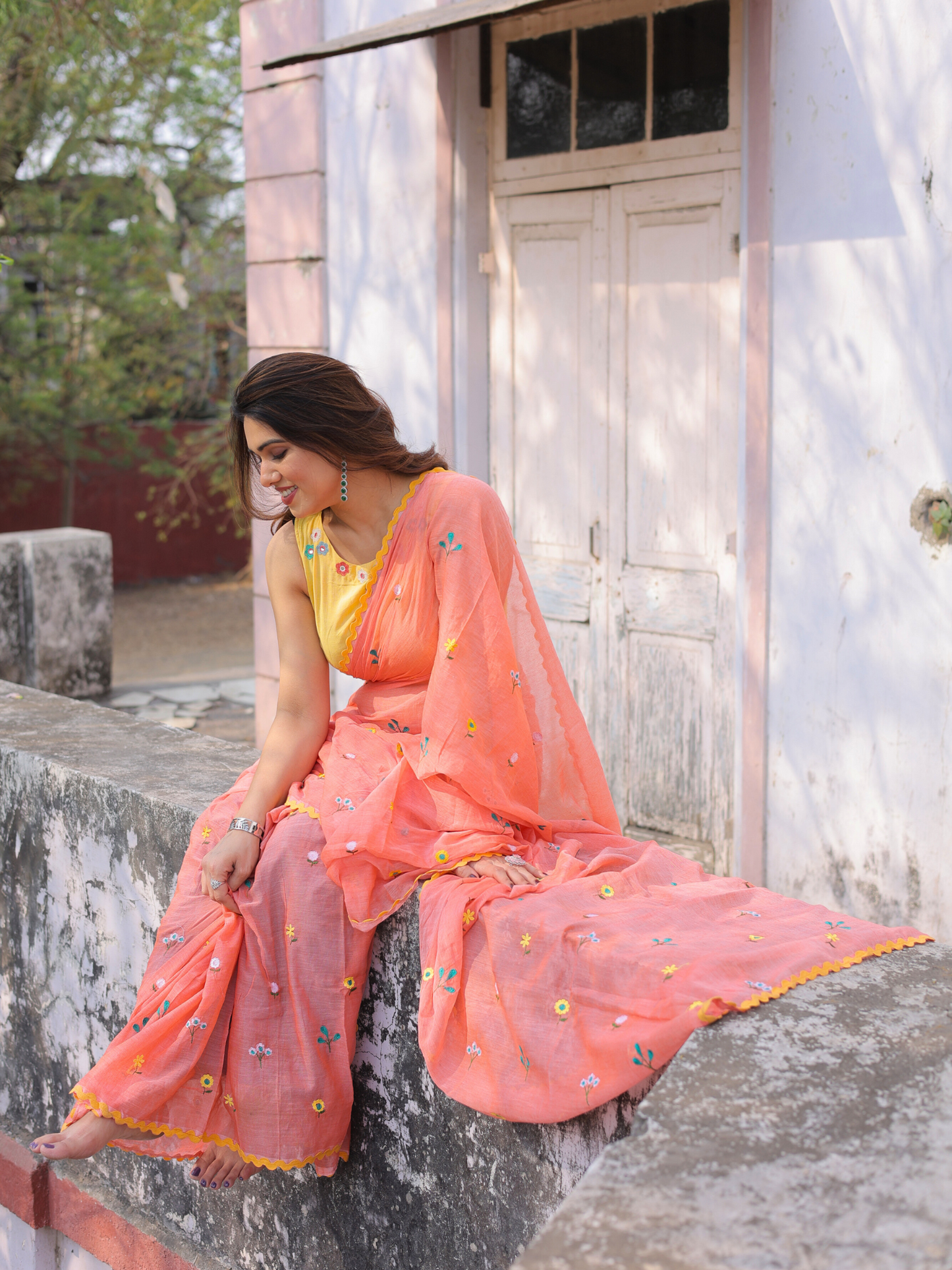 Ganik peach embroidered saree with blouse