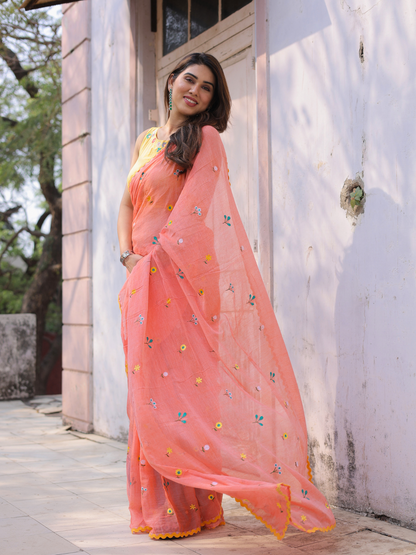 Ganik peach embroidered saree with blouse