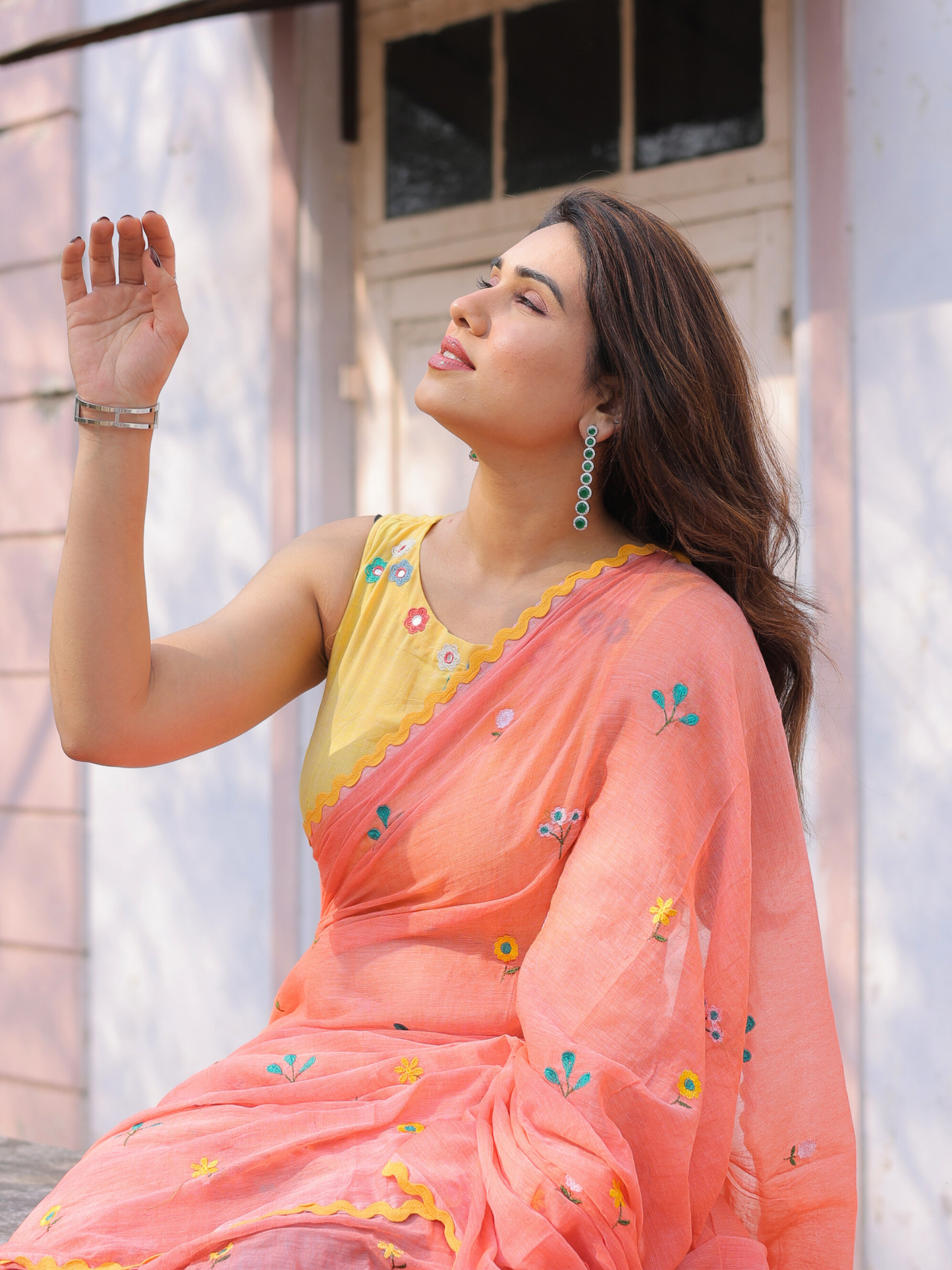 Ganik peach embroidered saree with blouse