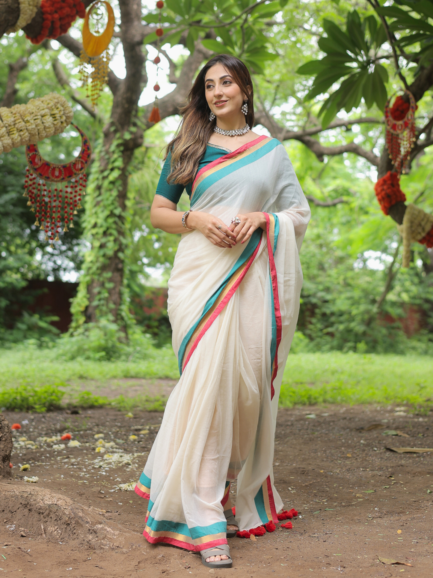 Rama ivory cotton saree with embroidered blouse