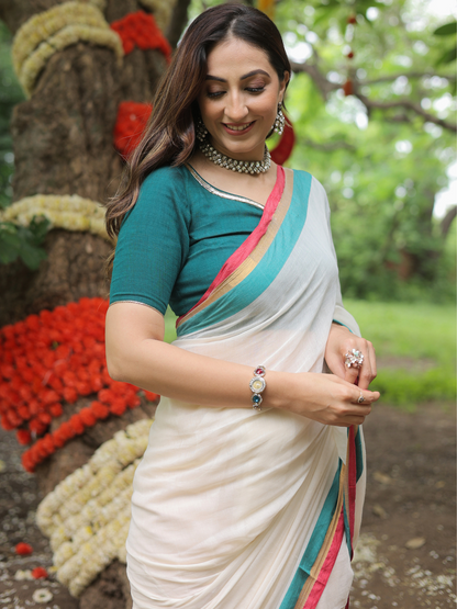 Rama ivory cotton saree with embroidered blouse