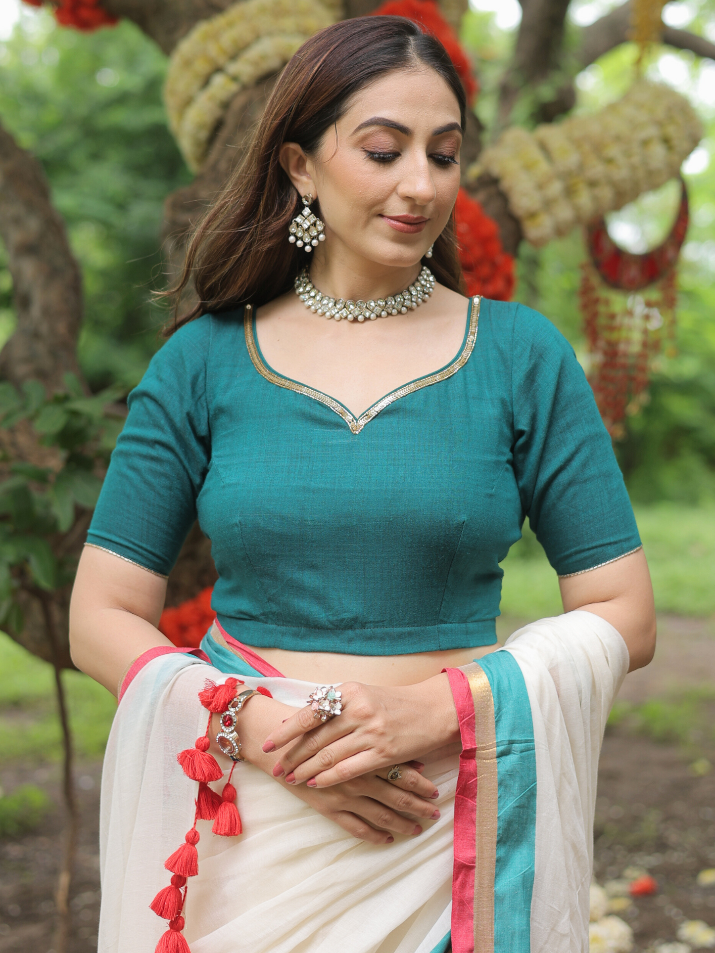 Rama ivory cotton saree with embroidered blouse