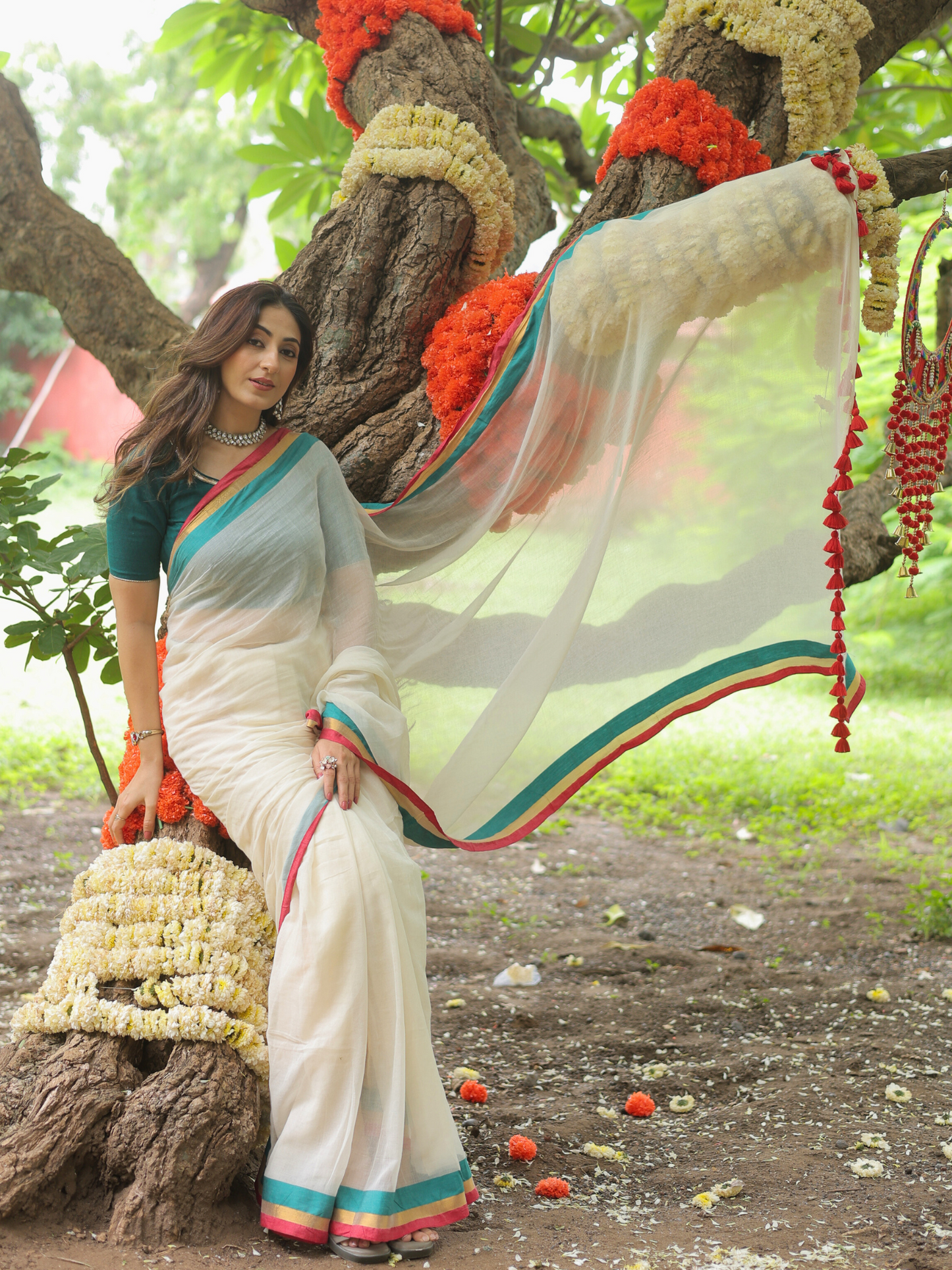 Rama ivory cotton saree with embroidered blouse