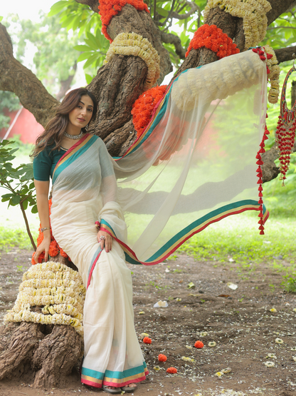 Rama ivory cotton saree with embroidered blouse