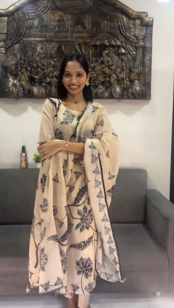 JANHAVI IN CREAM AND GREEN LINEN KURTA SET